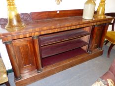 A 19th.C.MAHOGANY CLASSICAL STYLE BOOKCASE/SIDE CABINET WITH SCROLL CARVED BACKBOARD ABOVE THREE