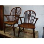 A 19th.C.YEW WOOD AND ELM WINDSOR WHEELBACK ARMCHAIR TOGETHER WITH A SIMILAR SMALLER CHAIR WITH