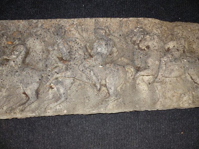 AN OLD RECONSTITUTED LONG RELIEF PANEL DEPICTING SOLDIERS ON HORSEBACK. W.148cms.