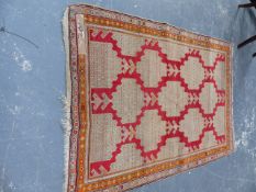 AN ANTIQUE CAUCASIAN RUG. 178x126cms.