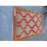 AN ANTIQUE CAUCASIAN RUG. 178x126cms.