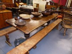 A LARGE 19\th.C.OAK REFECTORY TABLE ON CARVED BALUSTER SUPPORTS. L.227 x W.79.5cms.