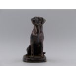 A SEATED FIGURE OF A GOLDEN RETRIVER HALLMARKED SILVER DATED 2001, SHEFFIELD.(FILLED) H. (APPROX)