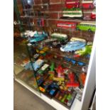 A LARGE QUANTITY OF VINTAGE DIE CAST TOYS AND VEHICLES TO INCLUDE DINKY, BRITAINS, CORGI AND OTHERS.