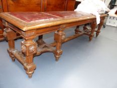 AN ANTIQUE CARVED OAK FRENCH STYLE GALLERY BENCH/ WINDOW SEAT, FLUTED STRETCHERED LEGS AND NAILED