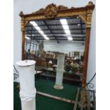 A LARGE VICTORIAN OVERMANTLE MIRROR WITH CARVED PAINTED FRAME. H.184 x W.170cms.
