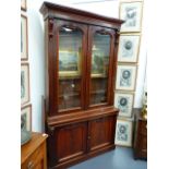 A VICTORIAN MAHOGANY GLAZED BOOKCASE. W.134 x H.246cms.