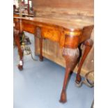 AN ANTIQUE AND LATER WALNUT GAMES TABLE IN THE EARLY GEORGIAN STYLE WITH CARVED CABRIOLE LEGS,