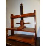 AN ANTIQUE BEECHWOOD LINEN PRESS/CLAMP.