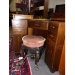 A HEAL'S STYLE AMERICAN WALNUT CORNER DESK WITH FIVE DRAWERS.