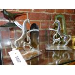 A PAIR OF ART DECO CHROMED EQUESTRIAN BOOK ENDS.DESIGNED BY FRANZ HAGENAUR H.14cms.