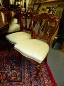 A SET OF TWELVE VICTORIAN STYLE MAHOGANY SHAPED BALLOON BACK DINING CHAIRS