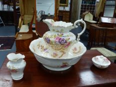 A VICTORIAN WASH JUG AND BOWL SET.