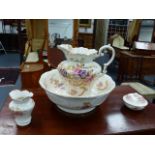 A VICTORIAN WASH JUG AND BOWL SET.