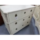 AN ANTIQUE CONTINENTAL PAINTED PINE THREE DRAWER CHEST OF NEOCLASSICAL DESIGN. H.80 x W.95 x D.