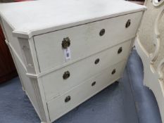 AN ANTIQUE CONTINENTAL PAINTED PINE THREE DRAWER CHEST OF NEOCLASSICAL DESIGN. H.80 x W.95 x D.