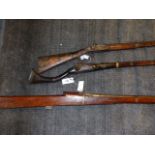 AN ANTIQUE EASTERN PERCUSSION LONG GUN, A FULL STOCK PERCUSSION GUN AND AND INDIAN MATCHLOCK RAMPART