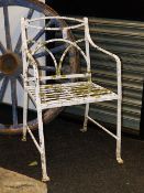 AN EARLY 19th.C.WROUGHT IRON GARDEN ARMCHAIR WITH ARCHED SCROLL BACK.