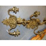 A PAIR OF ORMOLU REGENCE STYLE FRENCH THREE LIGHT WALL APPLIQUES, SCROLLED FOLIATE BRANCHES ISSUE