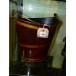 AN ANTIQUE TOLE SWING HANDLE BUCKET WITH FAUX GRAINED DECORATION.