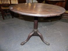 A GEO.III. MAHOGANY TRIPOD TABLE WITH SINGLE PIECE TOP OVER GUN BARREL COLUMN AND STOUT CARVED