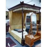 A 19th.C.AND LATER MAHOGANY FOUR POSTER BED WITH CARVED CANOPY. INSIDE WIDTH 153cms.