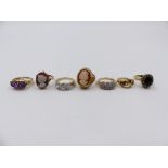 SEVEN VARIOUS 9ct HALLMARKED DRESS RINGS TO INCLUDE AN AMETHYST, TWO CAMEOS, A SAPPHIRE AND