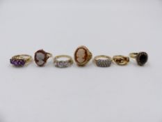 SEVEN VARIOUS 9ct HALLMARKED DRESS RINGS TO INCLUDE AN AMETHYST, TWO CAMEOS, A SAPPHIRE AND