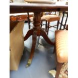 A LATE GEORGIAN MAHOGANY EXTENDING TILT TOP BREAKFAST TABLE.