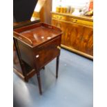 A MAHOGANY BEDSIDE CABINET.