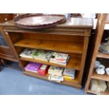 A LATE VICTORIAN OAK BOOKCASE.