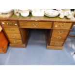 A VICTORIAN ROSEWOOD PEDESTAL DESK.