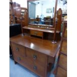 AN ARTS AND CRAFTS MAHOGANY DRESSING CHEST.