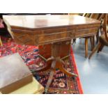 A LATE GEORGIAN MAHOGANY FOLD OVER CARD TABLE.