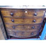 AN EARLY VICTORIAN MAHOGANY BOW FRONT CHEST OF DRAWERS