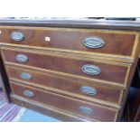 AN INLAID MAHOGANY CHEST OF DRAWERS.