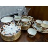 AN EDWARDIAN TEASET AND TWO CUT GLASS VASES.