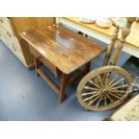 A RUSTIC PINE LOW TABLE AND A SPINNING WHEEL.