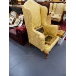 A GEO.I.STYLE WING BACK ARMCHAIR.