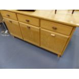 A MODERN OAK SIDEBOARD.