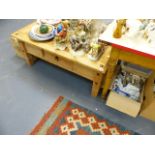 A VICTORIAN PINE KITCHEN TABLE AND A MODERN PINE COFFEE TABLE.