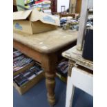 A LARGE VICTORIAN PINE KITCHEN TABLE.