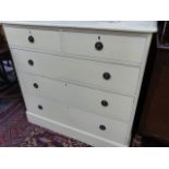 A VICTORIAN PAINTED PINE CHEST OF DRAWERS.