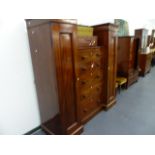 AN EARLY 19th.C.MAHOGANY PILLAR BOX WARDROBE CHEST.