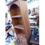 A SMALL PINE BOOKCASE.