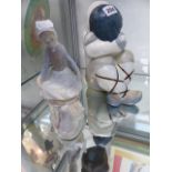 A LLADRO FIGURINE OF A GIRL WITH A RABBIT AND A MATT GLAZED LLADRO ESKIMO GIRL.