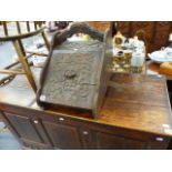 A VICTORIAN CARVED OAK COAL BOX AND TWO SIDE CHAIRS.