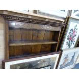 A BESPOKE OAK WALL SHELF.