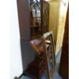 A GEORGIAN MAHOGANY BUREAU WITH ASSOCIATED BOOKCASE.