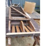 A LARGE SET OF WOODEN STEP LADDERS.